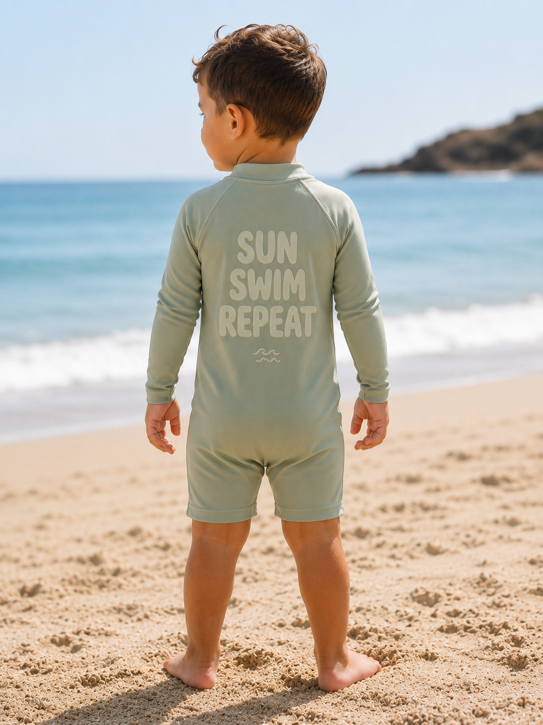 Another soft-focus glimpse of a child at the beach